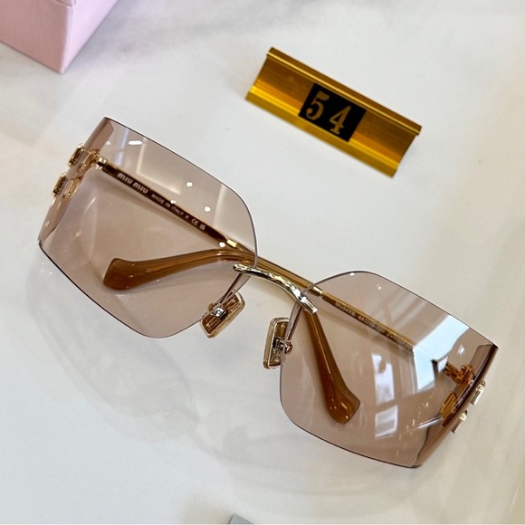Miu Miu Rimless Sunglasses with Brown Gradient Lenses and Gold Accents main image 6